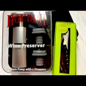 Houdini wine pump with corks and Food Network cork screw